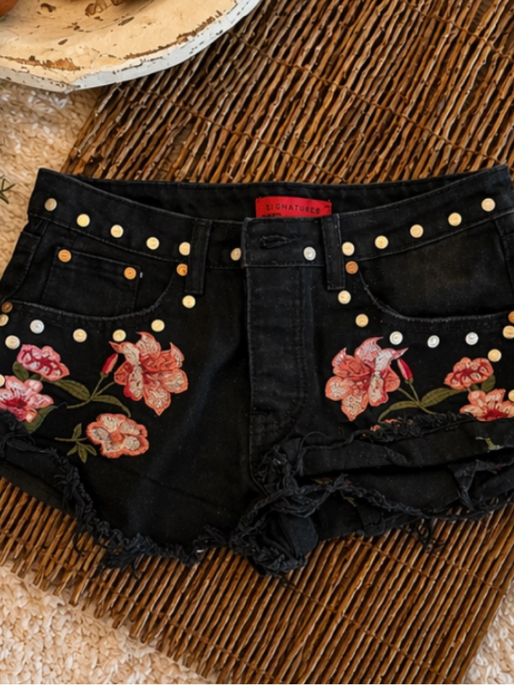 Signature Black Denim Shorts with Pink Floral Embroidery & Gold Studs